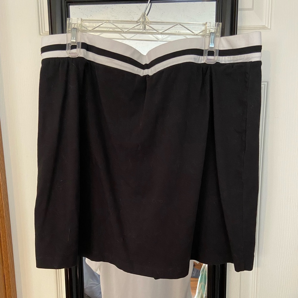Women's Black golf skirt with hidden shorts